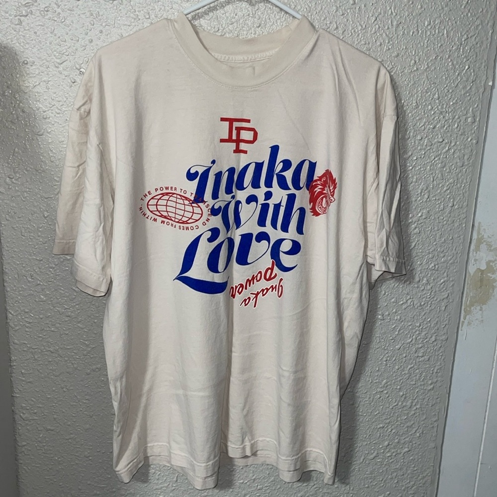 Inaka Power shirt in size L